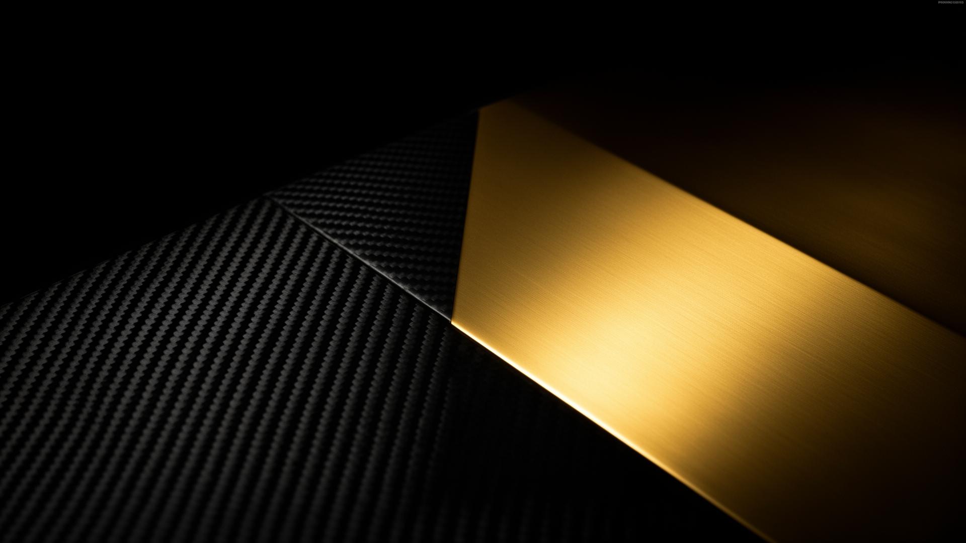 Carbon fiber and brushed gold composition